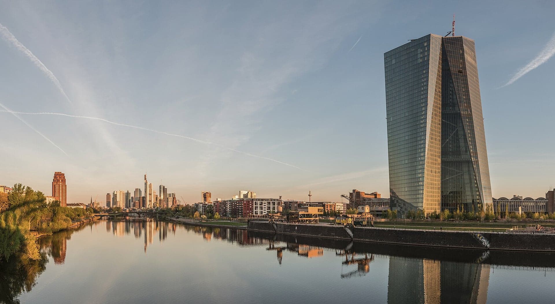 The Frankfurt skyline and financial district at dawn along the River Main, Germany